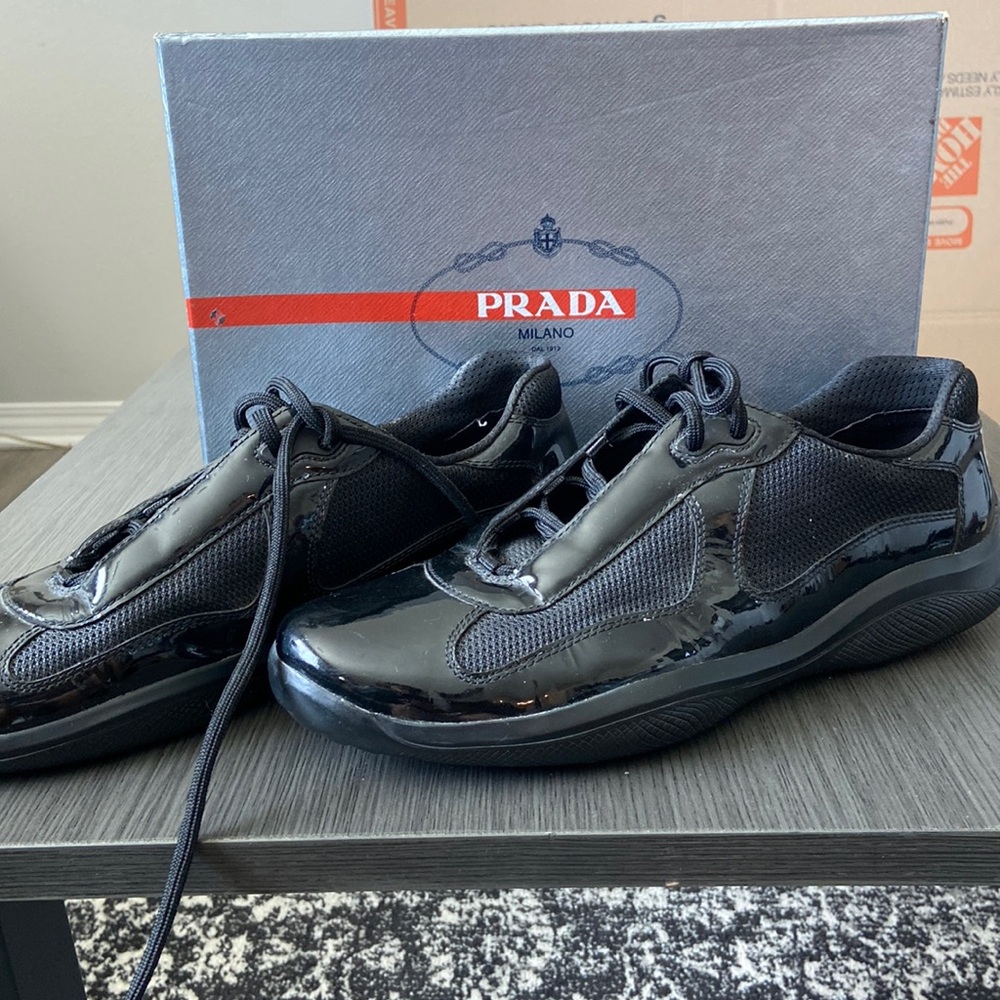 Mens Prada sneakers. Eur size 11 US size 12. Comes with box and dust bag.